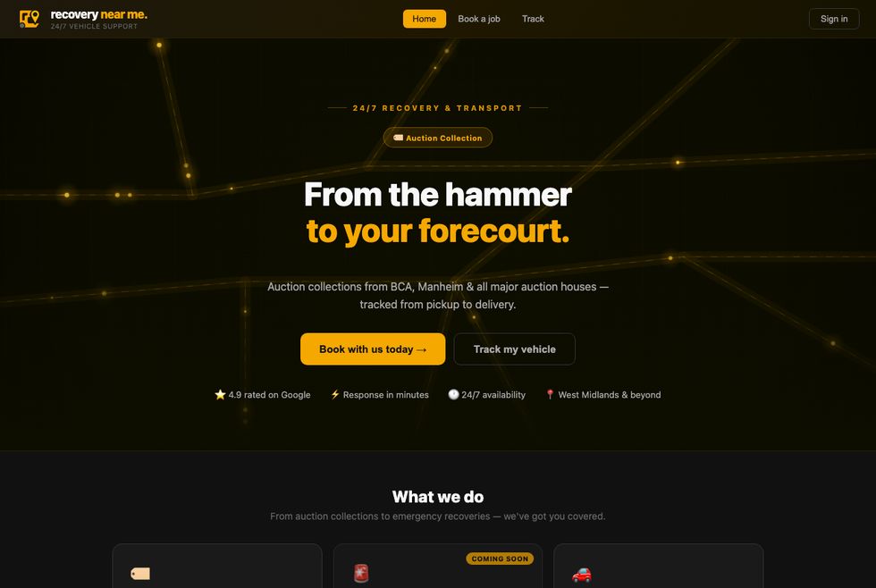 The Recovery Near Me homepage — a dark, gold-accented 24/7 vehicle recovery platform with live job booking and tracking